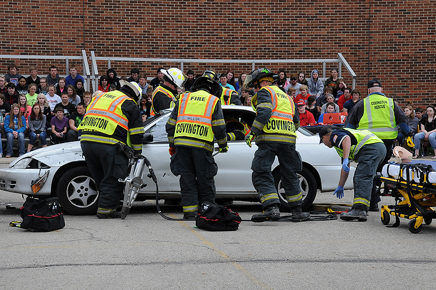 Covington Schools, the Police Department, the Fire Department, the Rescue Squad and Premier Health all teamed up to conduct a Mock Car Crash to educate Covington High School students on the dangers of driving impaired.